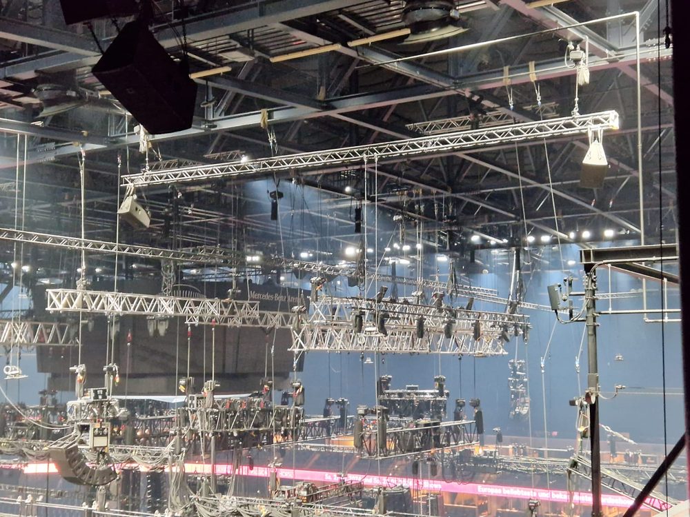 Lighting truss and rig hanging inside a large arena