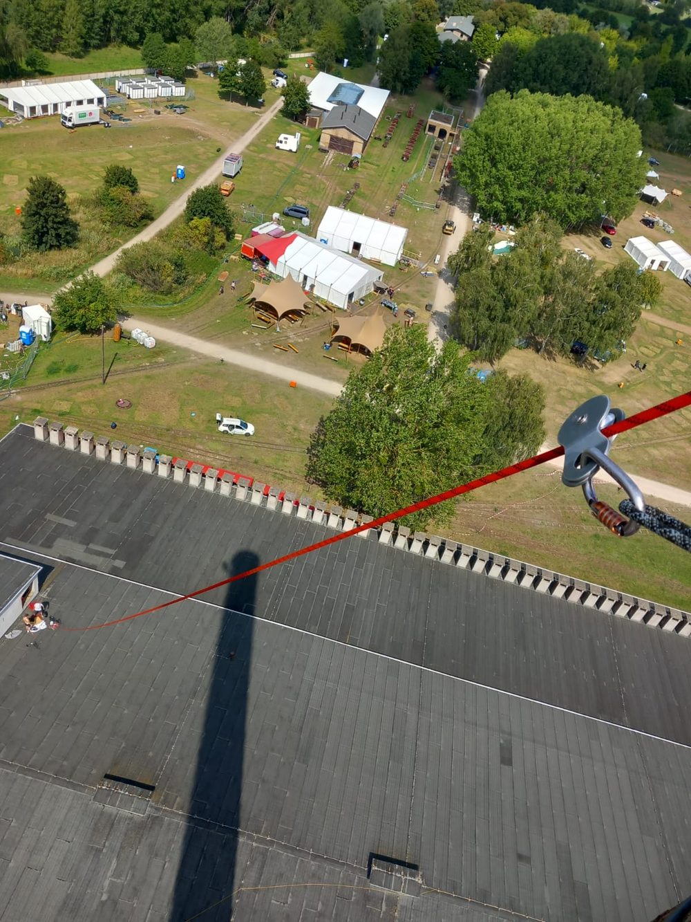 Rigging shackle overhead a festival site during build-up